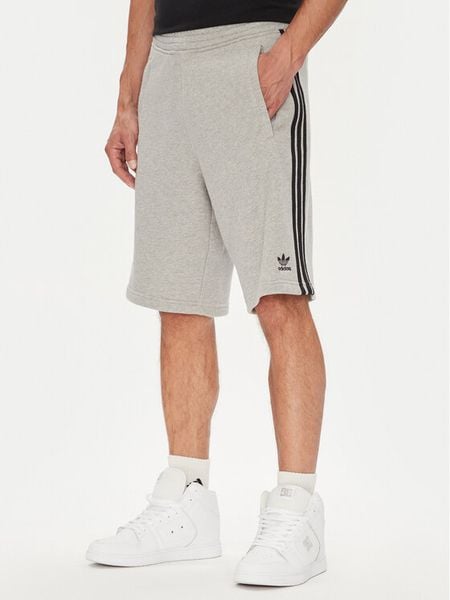 Adidas Szorty sportowe adicolor 3-Stripes JY1381 Szary Regular Fit. Szare krótkie spodenki sportowe Adidas, l, bez wzorów, z bawełny. Za 129.99 zł.