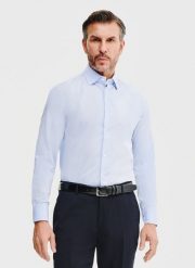 PAKO LORENTE – Bawełniana koszula męska w kolorze niebieskiem. Niebieskie koszule Pako Lorente, na wiosnę, m, bez wzorów, z bawełny, bez kołnierzyka, bez ramiączek. Za 199.99 zł.