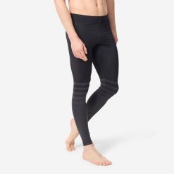 Legginsy UV surfing 100 męskie. Czarne legginsy długie sportowe OLAIAN, m, bez wzorów, z dzianiny, na fitness i siłownię. Za 69.99 zł.
