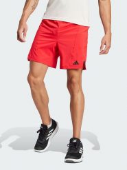 Adidas Szorty sportowe w kolorze czerwonym rozmiar: M 7. Czerwone krótkie spodenki sportowe Adidas, m, bez wzorów. Za 94.45 zł.
