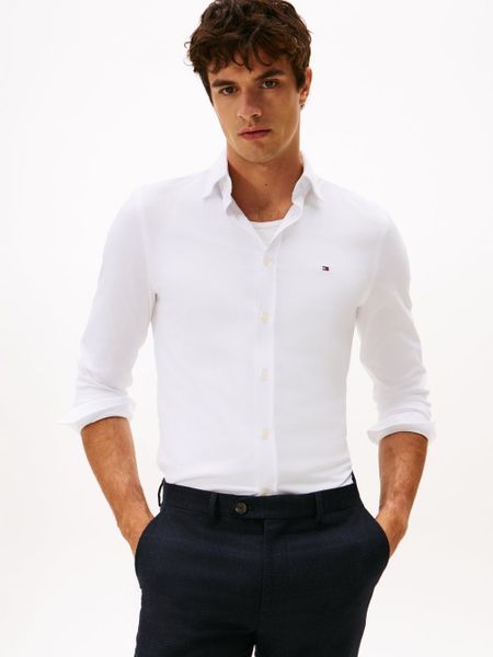 Tommy Hilfiger koszula casual Mężczyźni Slim Fit biały, L. Białe koszule Tommy Hilfiger, l, bez wzorów, z bawełny, bez kołnierzyka, bez ramiączek. Za 329.95 zł.