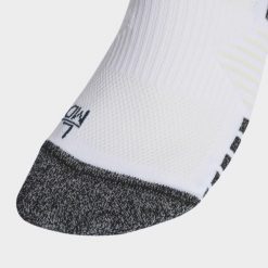 Getry wyjazdowe Meksyk 26. Białe legginsy długie sportowe Adidas, bez wzorów, do piłki nożnej. Za 79.95 zł.