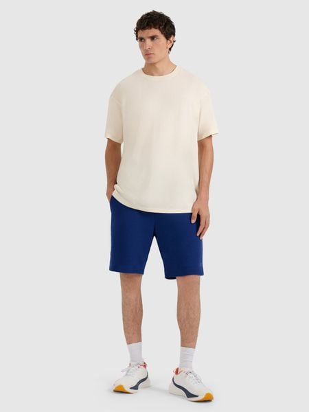 4F Spodenki dresowe regular męskie - granatowe XXL. Niebieskie krótkie spodenki sportowe 4F, l, bez wzorów, z bawełny, sportowe. Za 79.99 zł.