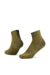 Skarpety do biegania Coolnet Quarter. Zielone skarpety Buff, bez wzorów, z materiału. Za 99.99 zł.
