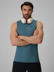 4F Koszulka treningowa regular szybkoschnąca męska - turkusowa S. Niebieskie t-shirty 4F, m, bez wzorów, z materiału, bez kołnierzyka, bez ramiączek. Za 69.99 zł.