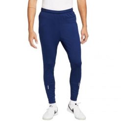 Męskie Spodnie Do Biegania ThermaFit Strike. Niebieskie buty do biegania Nike, bez wzorów, bez zapięcia, do biegania. Za 315.99 zł.