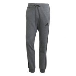 Spodnie do biegania adidas Essentials 3-Stripes Fleece. Szare buty do biegania Adidas, bez wzorów, bez zapięcia, do biegania. Za 303.50 zł.