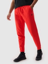 4F Spodnie dresowe joggery męskie - czerwone M. Czerwone joggery i bojówki 4F, na co dzień, l, bez wzorów, z bawełny, sportowe. Za 149.99 zł.