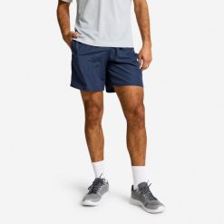 Spodenki fitness cardio męskie Domyos. Niebieskie krótkie spodenki sportowe DOMYOS, l, bez wzorów, z materiału. Za 19.99 zł.