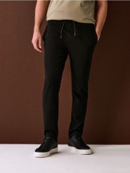 Spodnie dresowe jogger ottoman - czarny. Czarne joggery i bojówki Sinsay, l, bez wzorów, z dresówki. Za 59.99 zł.