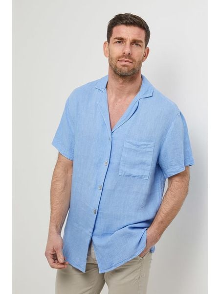 Rodier Lin Lniana koszula w kolorze błękitnym rozmiar: M/L. Niebieskie koszule Rodier Lin, l, bez wzorów, ze lnu, bez kołnierzyka, bez ramiączek. Za 131.74 zł.