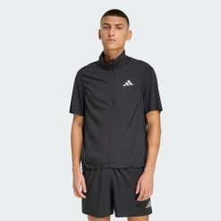 Kurtka bez rękawów adidas Essentials. Czarne kurtki Adidas, bez wzorów, bez kaptura. Za 219.00 zł.