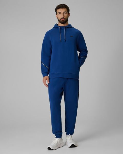 4F Spodnie dresowe joggery męskie - granatowe M. Niebieskie joggery i bojówki 4F, m, bez wzorów, z dresówki. Za 159.99 zł.