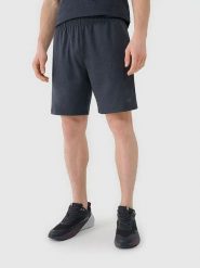 4F Szorty sportowe w kolorze granatowym rozmiar: L. Niebieskie krótkie spodenki sportowe 4F, l, bez wzorów, z materiału. Za 61.60 zł.