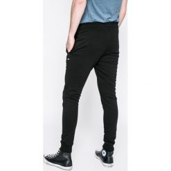 Produkt by Jack & Jones - Spodnie. Czerwone spodnie treningowe długie PRODUKT by Jack & Jones, m, bez wzorów, z bawełny. W wyprzedaży za 69.90 zł.