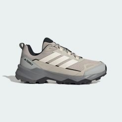 Buty na piesze wycieczki Terrex Skychaser Ax5. Brązowe buty turystyczne Adidas, bez wzorów, z tkaniny, bez zapięcia, trekkingowe. Za 428.45 zł.