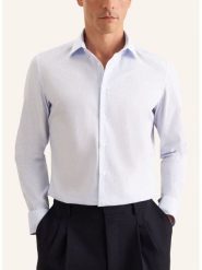 Seidensticker Koszula w kolorze błękitnym rozmiar: 41. Niebieskie koszule Seidensticker, bez wzorów, z bawełny, bez kołnierzyka, bez ramiączek. Za 119.12 zł.