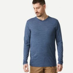Koszulka trekkingowa z długim rękawem męska Forclaz Travel 500 Merino. Niebieskie bluzki z długim rękawem FORCLAZ, l, bez wzorów, z materiału, bez kołnierzyka, bez ramiączek. Za 129.99 zł.