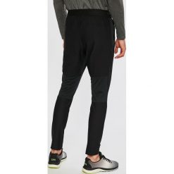 Under Armour - Spodnie Threadborne Vanish. Spodnie treningowe długie Under Armour. W wyprzedaży za 159.90 zł.