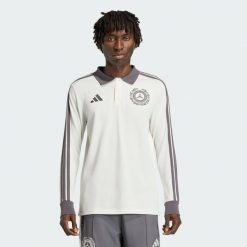 Koszulka Polo Mercedes - Amg Petronas Formula 1 Team Silver Arrows Icon. Białe koszulki polo Adidas, m, bez wzorów, bez kołnierzyka, bez ramiączek. Za 349.00 zł.