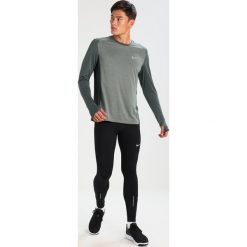 Nike Performance POWER TECH Legginsy black. Spodnie treningowe długie Nike Performance, z elastanu. W wyprzedaży za 191.20 zł.