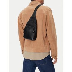 Saszetka GINO ROSSI. Czarne saszetki i nerki Gino Rossi, bez wzorów, małe, bez dodatków. Za 119.99 zł.