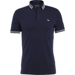 Emporio Armani Koszulka polo blu indigo. Koszulki polo marki Emporio Armani. W wyprzedaży za 344.25 zł.