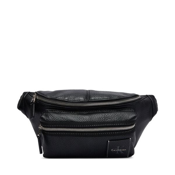 Nerka Calvin Klein. Czarne saszetki i nerki CALVIN KLEIN, bez wzorów. Za 409.99 zł.