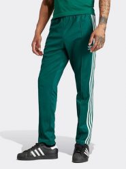 Adidas Spodnie sportowe w kolorze zielonym rozmiar: XXL. Zielone spodnie treningowe długie Adidas, xxl, bez wzorów. Za 150.37 zł.