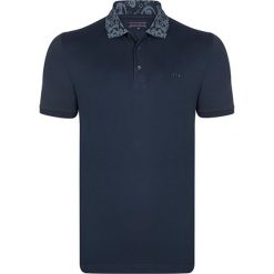 Koszulka polo w kolorze granatowym. Koszulki polo marki Felix Hardy. W wyprzedaży za 99.95 zł.
