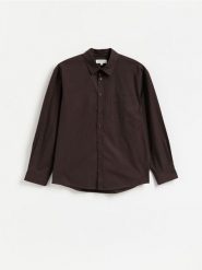 Bawełniana koszula oversize - ciemnobrązowy. Brązowe koszule Reserved, l, bez wzorów, z bawełny, bez kołnierzyka, bez ramiączek. Za 139.99 zł.
