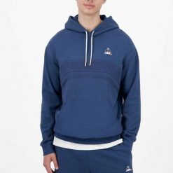 Bluza polarowa LE COQ SPORTIF 2520871L Niebieski. Niebieskie bluzy z kapturem le coq sportif, l, bez wzorów, z polaru, z kapturem. Za 255.99 zł.