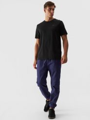4F Spodnie casual joggery męskie - granatowe M. Niebieskie joggery i bojówki 4F, na co dzień, l, bez wzorów, z bawełny, casualowe. W wyprzedaży za 99.99 zł.