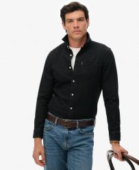Superdry Essential Koszula denim z długim rękawem z bawełny organicznej. Czarne koszule Superdry, m, bez wzorów, z bawełny, bez kołnierzyka, bez ramiączek. Za 280.80 zł.