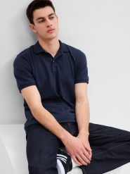 GAP Koszulka polo w kolorze granatowym rozmiar: XS. Niebieskie koszulki polo GAP, xs, bez wzorów, z bawełny, bez kołnierzyka, bez ramiączek. Za 61.89 zł.