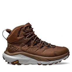Trekkingi Hoka. Brązowe botki sznurowane HOKA, bez wzorów, z gore-texu, bez obcasa, bez zapięcia. Za 839.99 zł.