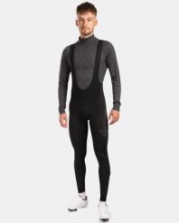 Męskie kolarskie legginsy Kilpi MOVI-M. Czarne legginsy długie sportowe Kilpi, l, bez wzorów, z nylonu, rowerowe. Za 344.59 zł.