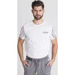 T-SHIRT GUESS. Białe t-shirty Guess, l, z aplikacjami, z bawełny, bez kołnierzyka, bez ramiączek. Za 101.40 zł.