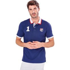 Koszulka polo w kolorze granatowym. Koszulki polo sportowe marki Camel Active, Auden Cavill. W wyprzedaży za 79.95 zł.