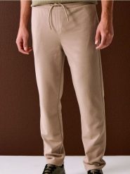 Spodnie dresowe jogger ottoman - beżowy. Brązowe joggery i bojówki Sinsay, l, bez wzorów, z dresówki. Za 59.99 zł.