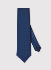 PAKO LORENTE - Granatowy krawat męski w mikrowzór. Niebieskie krawaty i muchy Pako Lorente, bez wzorów, z poliesteru. Za 99.99 zł.