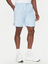 Lacoste Szorty tenisowe GH353T Błękitny Regular Fit. Niebieskie krótkie spodenki sportowe LACOSTE, m, bez wzorów, z syntetyku. Za 209.99 zł.
