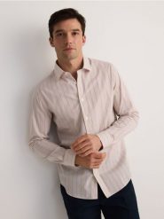 Koszula slim fit w paski - wielobarwny. Koszule Reserved, l, bez wzorów, z bawełny, bez kołnierzyka, bez ramiączek. W wyprzedaży za 119.99 zł.