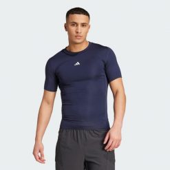 Koszulka TECHFIT Compression Training. Niebieskie odzież kompresyjna Adidas, bez wzorów, z materiału, na fitness i siłownię, techfit (adidas). Za 149.00 zł.