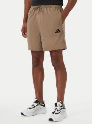 Adidas Szorty sportowe Essentials Small Logo Chelsea KF2400 Beżowy ciemny Regular Fit. Brązowe krótkie spodenki sportowe Adidas, m, bez wzorów, z syntetyku. Za 119.99 zł.
