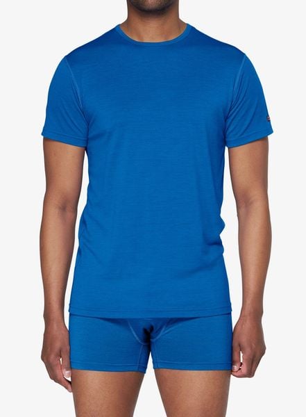 Koszulka termoaktywna Devold Breeze Merino 150 T-Shirt. Niebieskie bielizna termoaktywna Devold, m, bez wzorów, z materiału, bez ramiączek, outdoorowe. Za 351.99 zł.