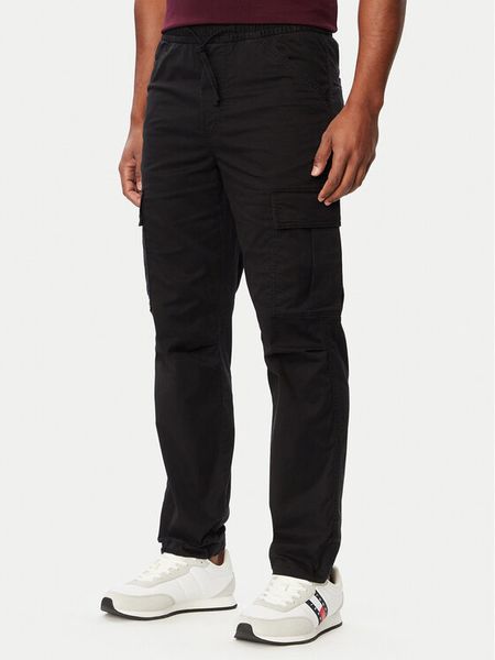 Tommy Jeans Joggery Sonny DM0DM23539 Czarny Regular Fit. Czarne joggery i bojówki Tommy Jeans, m, bez wzorów, z bawełny. Za 409.99 zł.