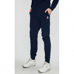 Reebok Classic - Spodnie. Niebieskie spodnie materiałowe Reebok Classic, na co dzień, l, bez wzorów, z bawełny, casualowe. W wyprzedaży za 159.90 zł.