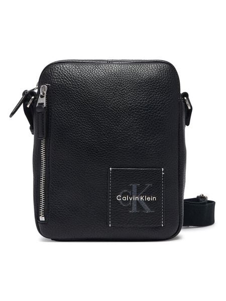 Calvin Klein Saszetka Bold Pebble Simple Reporter LV04D3623G Czarny. Czarne saszetki i nerki CALVIN KLEIN, bez wzorów, ze skóry. Za 369.99 zł.