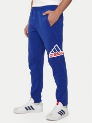 Adidas Spodnie dresowe Future Icons Badge of Sport IS9594 Niebieski Regular Fit. Niebieskie spodnie treningowe długie Adidas, m, bez wzorów, z bawełny. Za 189.99 zł.